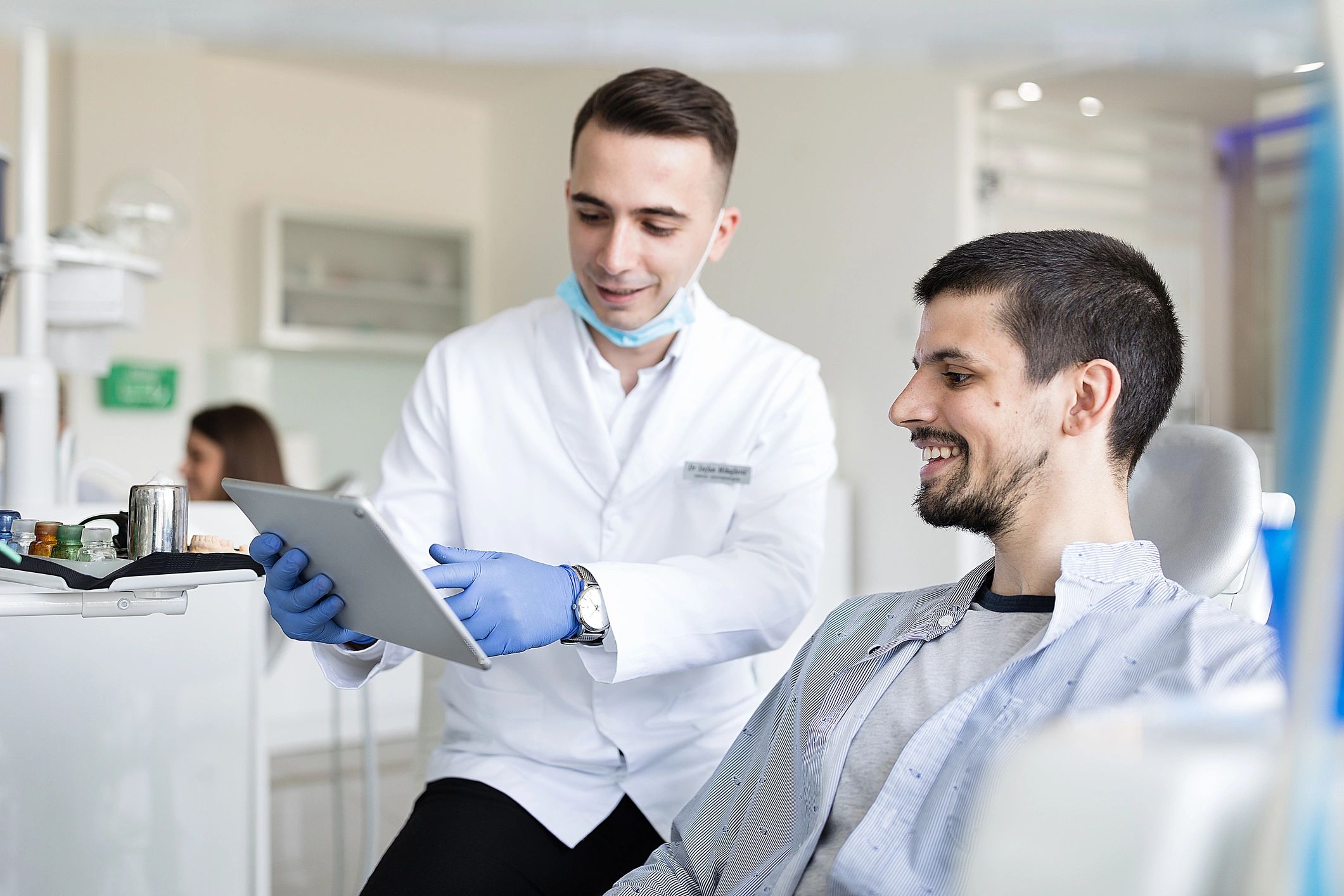 Dental implant consultation with dentist and patient