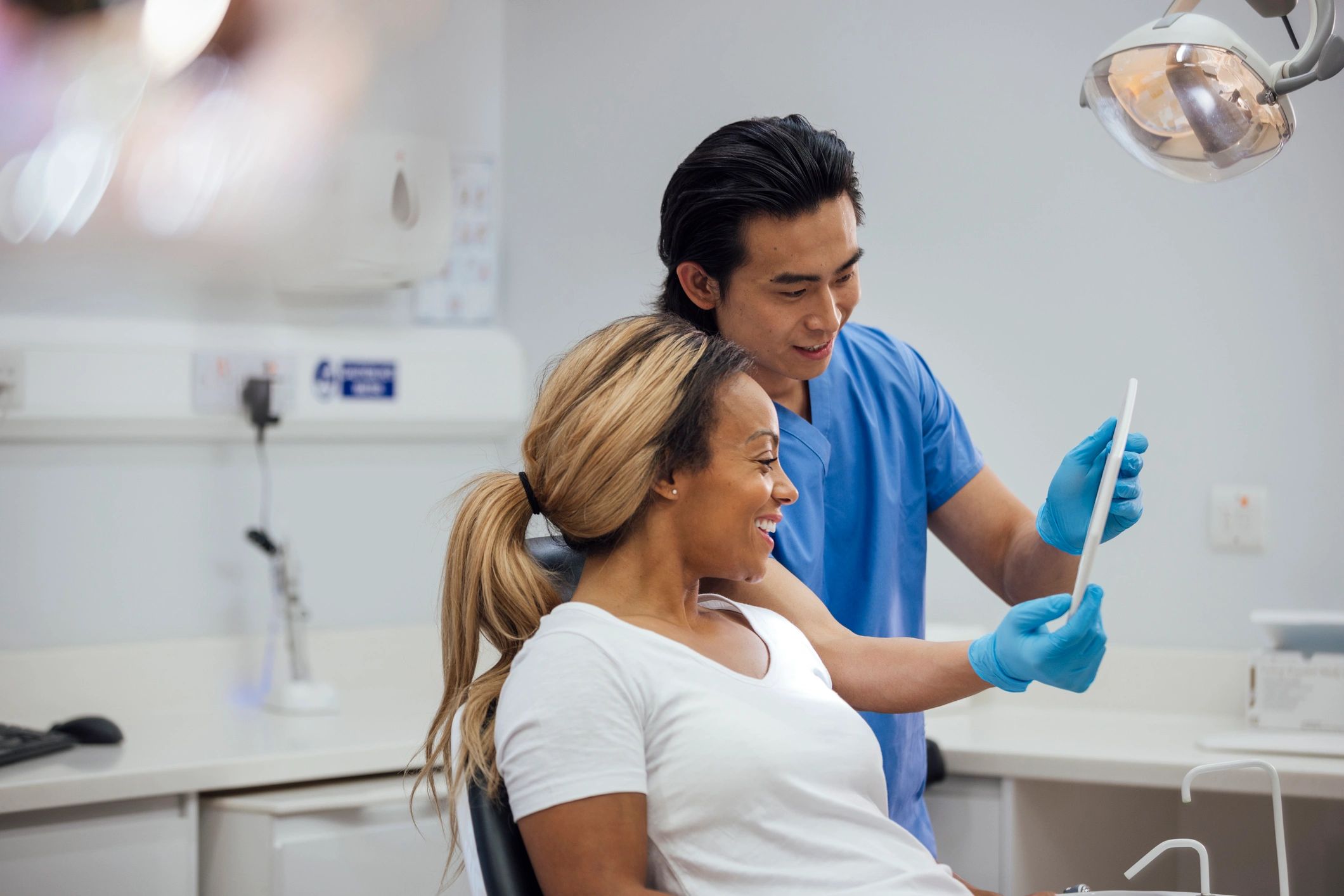 Dentist reviewing treatment progress with a patient