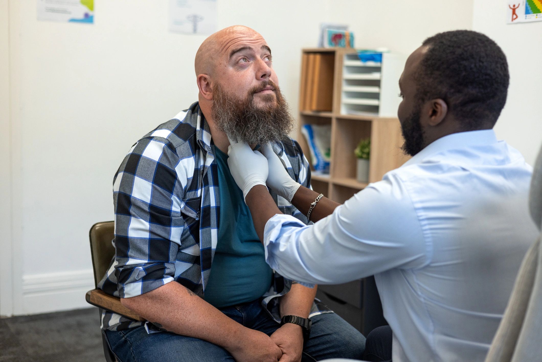 Provider consulting with a patient in a clinical setting